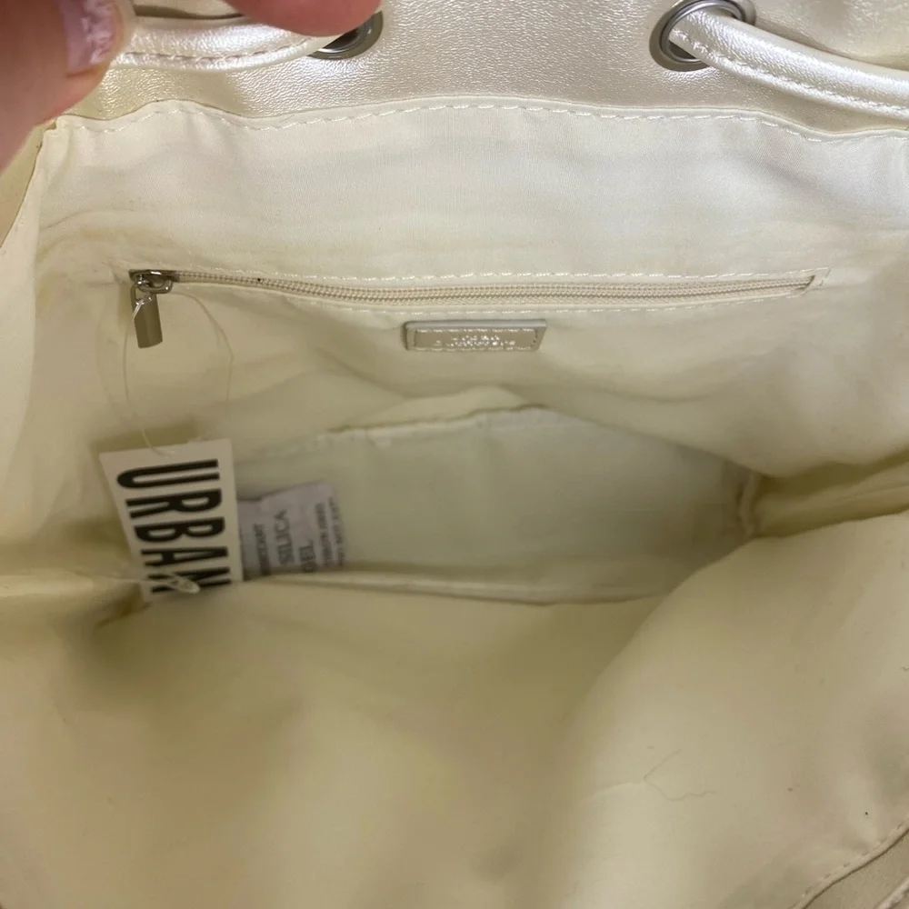 NWT UO IRIDESCENT CREAM BACKPACK